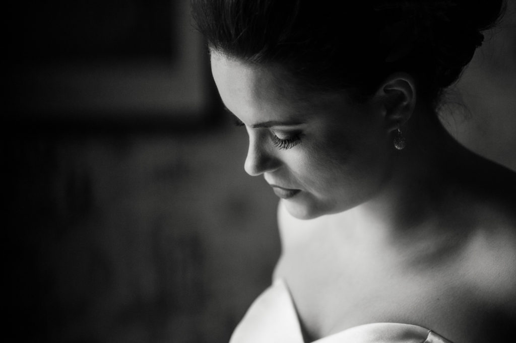 Black and white portrait of bride's face captured from above