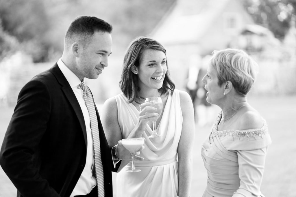 Guests chatting while enjoying post dinner cocktails